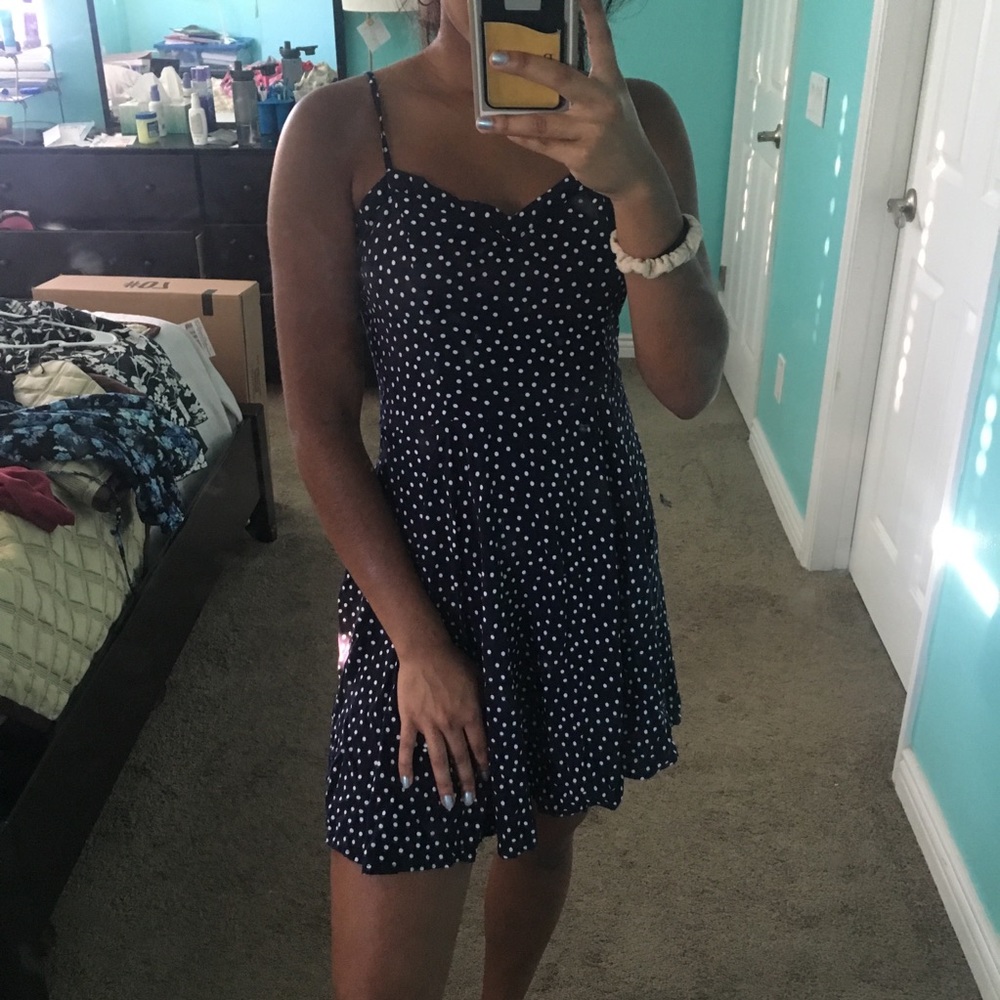 Navy blue dress with white polka dots
